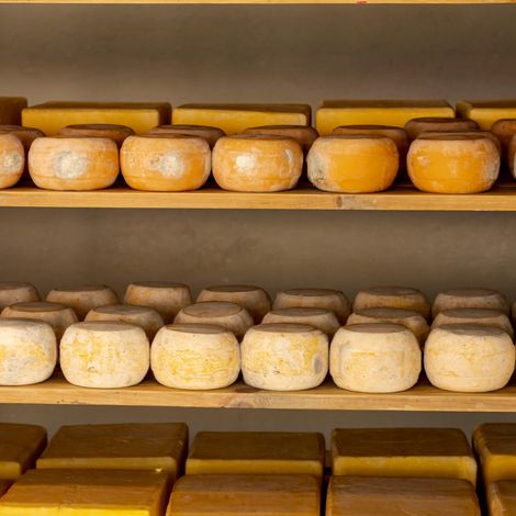 matured-cheese-wheels-shelfs.jpg