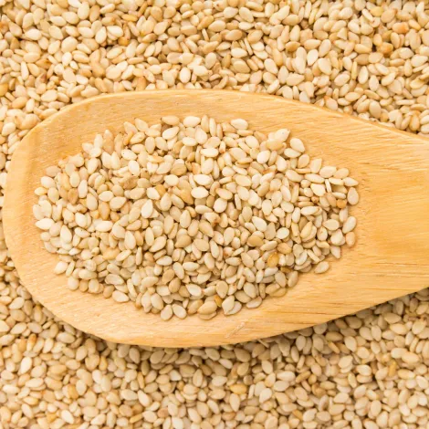 sesame-seeds-wooden-spoon.webp