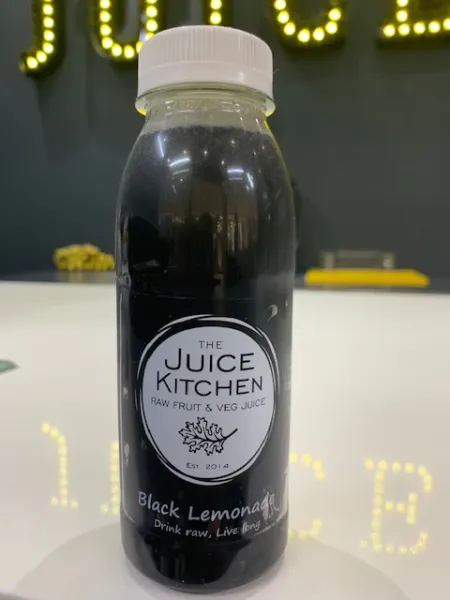 Black Lemonade (gut detoxer) from South Africa supplied by The Juice Kitchen - Black Lemon Juice