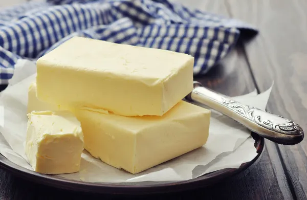Butter from 폴란드 supplied by Spółdzielnia Obrotu Towarowego Przemysłu Mleczarskiego - Block 우유버터