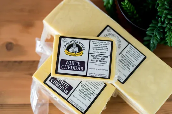 White Cheddar from 남아프리카공화국 supplied by Creighton Cheese Company - White 체다 치즈