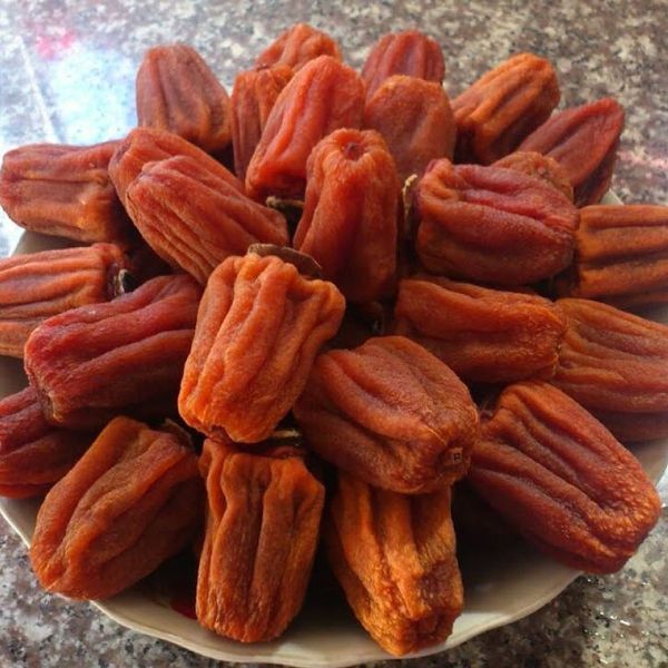 Dried Persimmon from Vietnam supplied by Dalat Specialty Agent - Peeled Fresh Persimmon