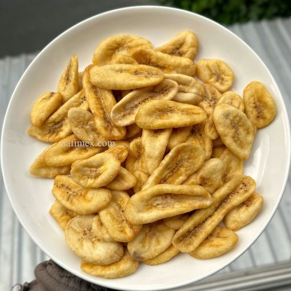 Wholesale vacuum fried banana chips OEM packing from Vietnam factory/Dried banana chips for export with high quality good price from Vietnam supplied by SAFIMEX JOINT STOCK COMPANY - Sliced Dried Banana